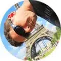 BluePeake Painting Services – Interior Painting in Annapolis MD A man wearing sunglasses posing in front of a landmark