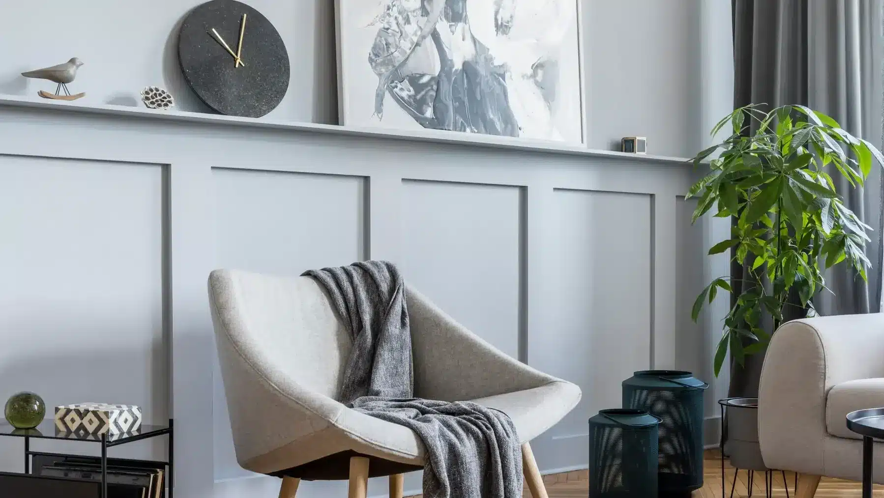 Modern living room with gray wainscoting and freshly painted walls