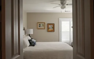 Residential Interior Painting Neutral Bedroom Annapolis Md View through double doors into a freshly painted bedroom with neutral beige walls