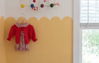 Residential Interior Painting Scalloped Yellow Wall Annapolis Md Child's bedroom featuring a two-tone wall with mustard yellow scalloped paint